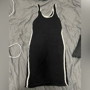 Black body con mini dress with white stripes on the side